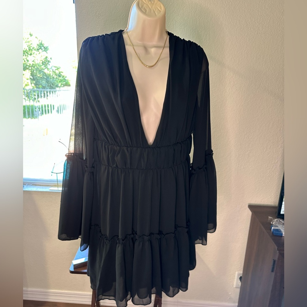 Black Boho dress with a sexy flare.
